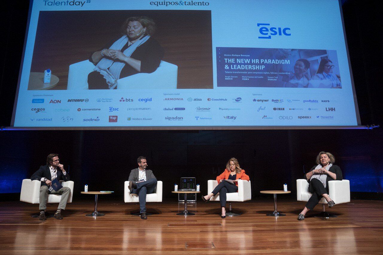 Profesionales durante su intervención en un evento 